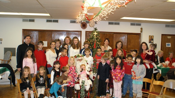 St. Nicholas with children and teachers of Sunday School S.O.C.L.